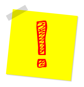 Sticky note with an exclamation mark