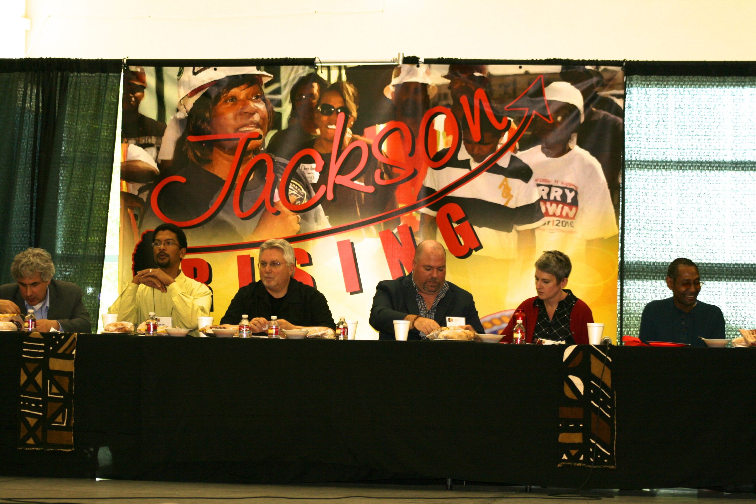 Scene from the Jackson Rising Conference featuring Michael Peck of One Worker/One Vote