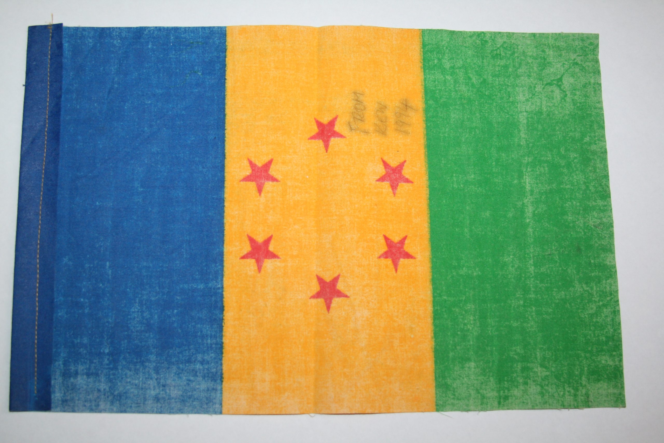 Ogoni flag signed by Ken Saro-Wiwa in 1994. Photographed by Alan Monahan. Maynooth University Ken Saro-Wiwa Archive.