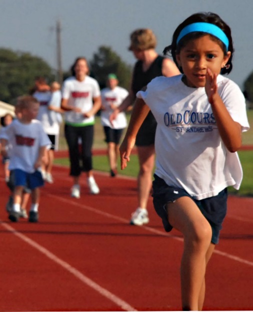 Girl running on track