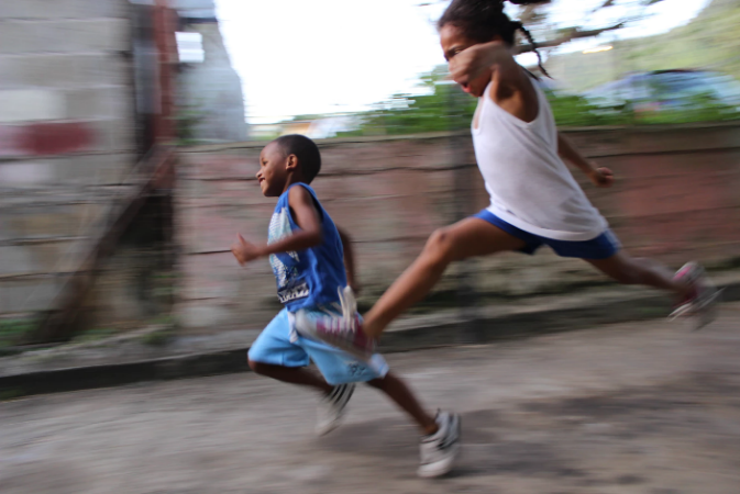 Picture of two children running