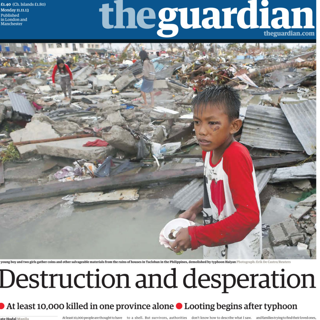 Child among wreckage on the cover of The Guardian