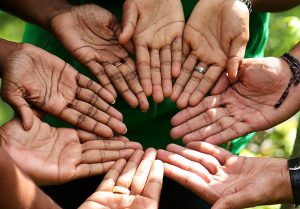 Staffs in Sri Lanka imitate the logo of CARE International.