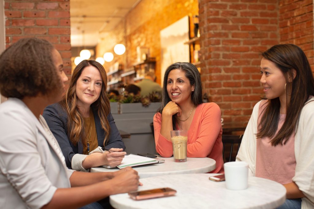 our women working in a business meeting in a cafe coffee shop