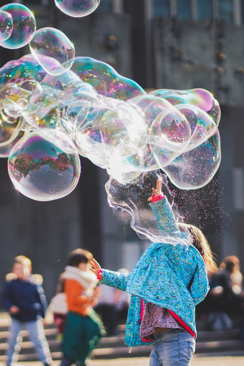 Image 9.10 child with giant bubbles by Alexander Dummer from Pexels is licensed under CC by 1.0
