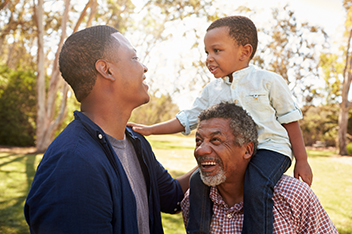 image of three generations, young boy, father, grandfather