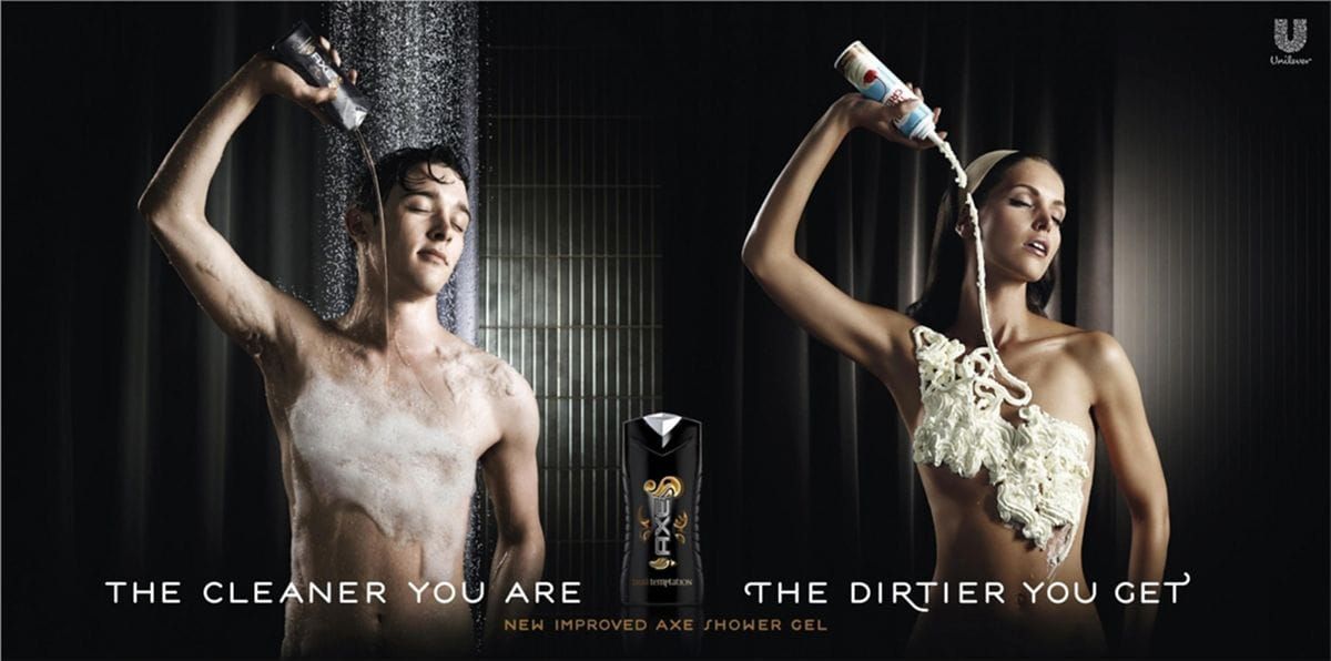 Axe Body Spray ad shows two nearly naked people. The man is pouring Axe on his body with the caption "The Cleaner you are" and the woman is pouring whipped cream from a can on her body and the caption says "The dirtier you get"