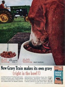 Gravy Train dog food ad shows a dog eating from a bowl while a man in a tractor drives by