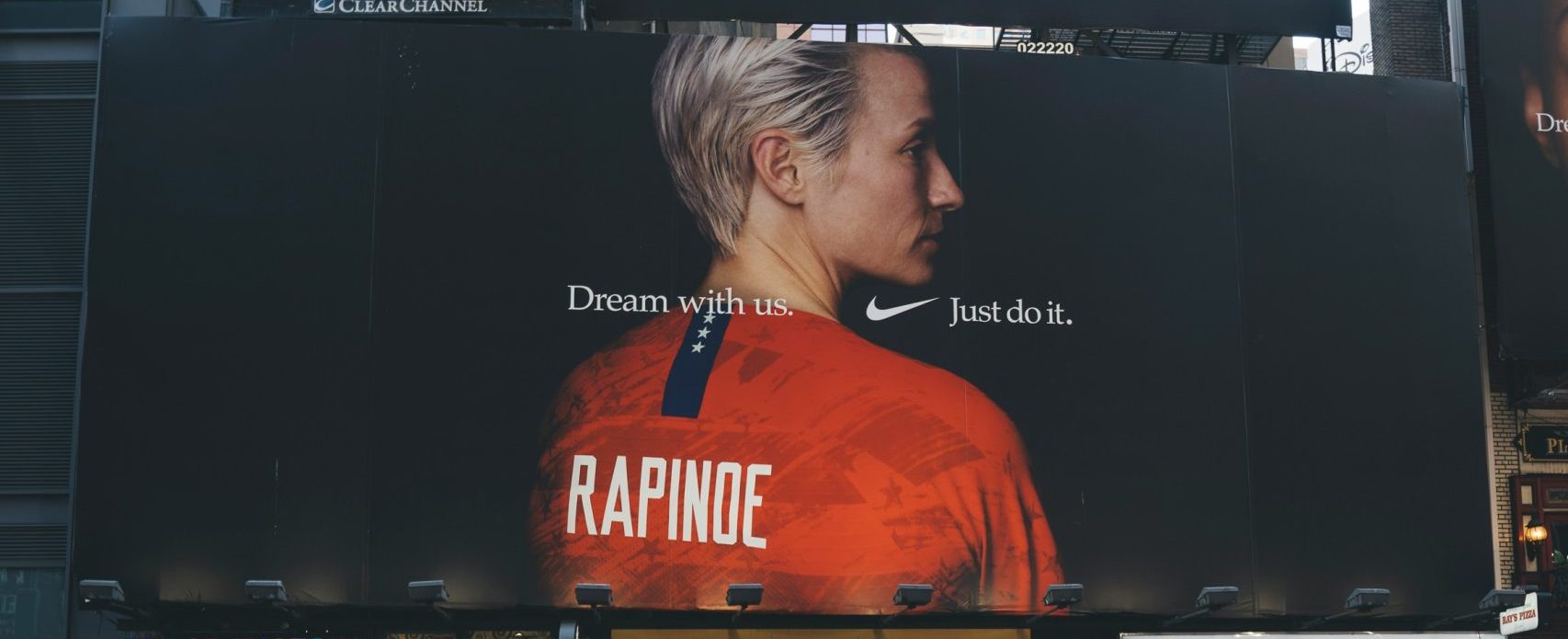 Megan Rapinoe is shown on a billboard