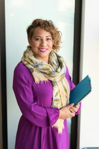 Woman holding folders