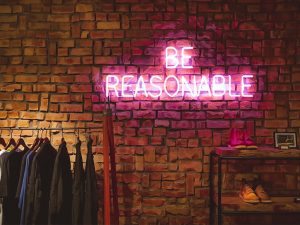 sign says be reasonable