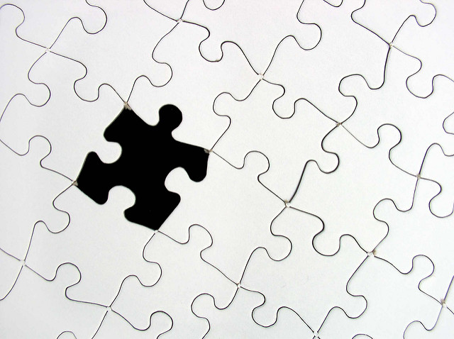A puzzle with one missing piece