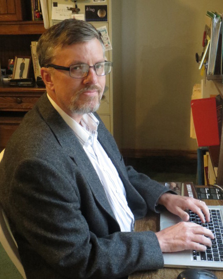 Man sitting at a computer