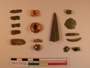 A series of small metal artifacts.