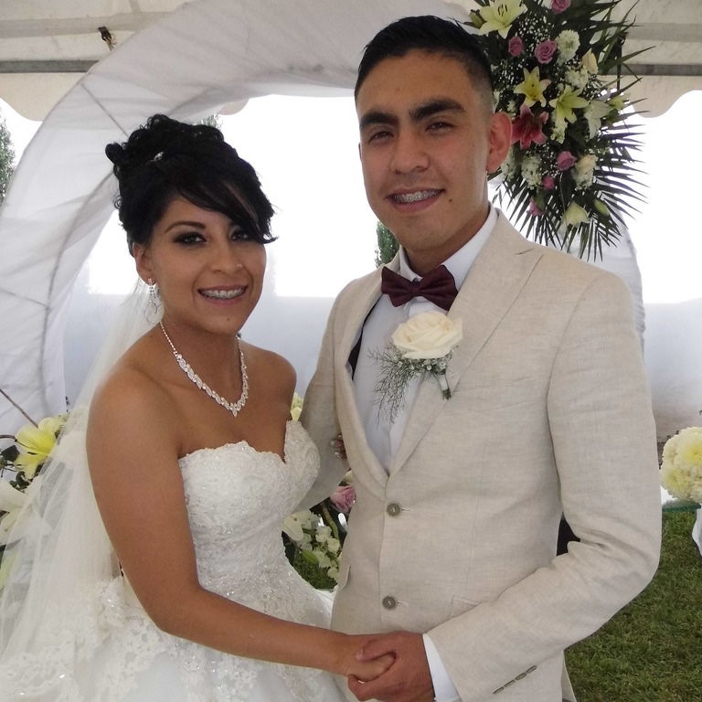 bride and groom smiling