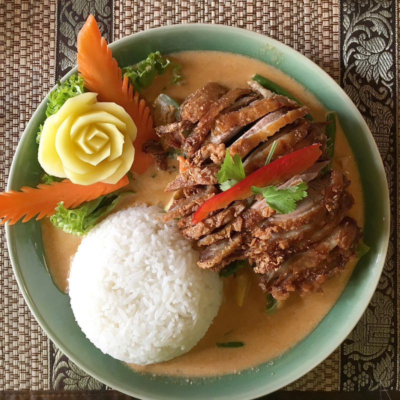 photo of bowl of curry with rice