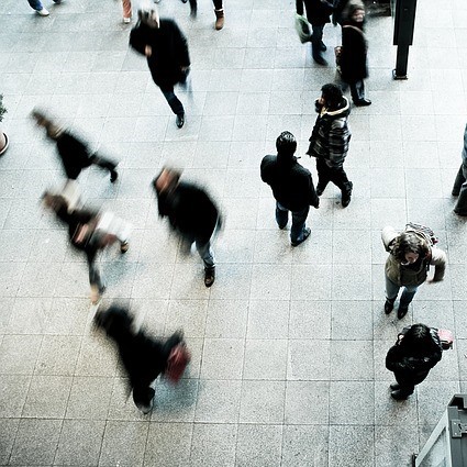 photo: birds eye view of people in a public place