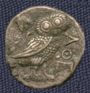 An Athenian coin with an Owl Symbol
