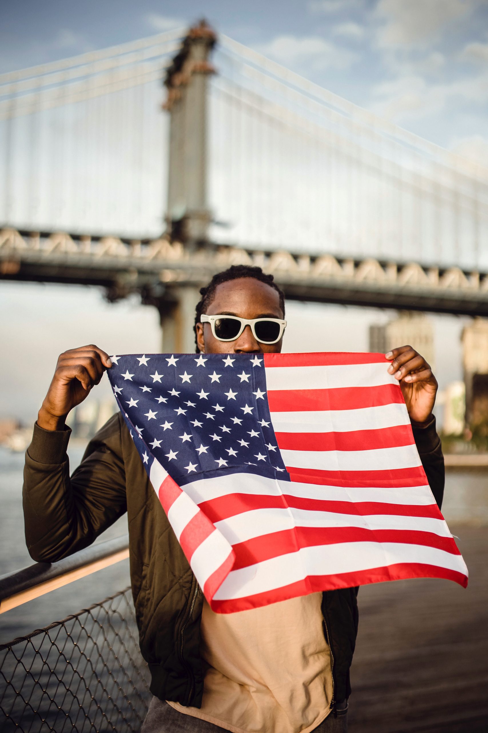 African American man holding American flag