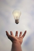 Man Catching Lightbulb