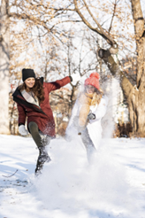 Women Playing in Snow