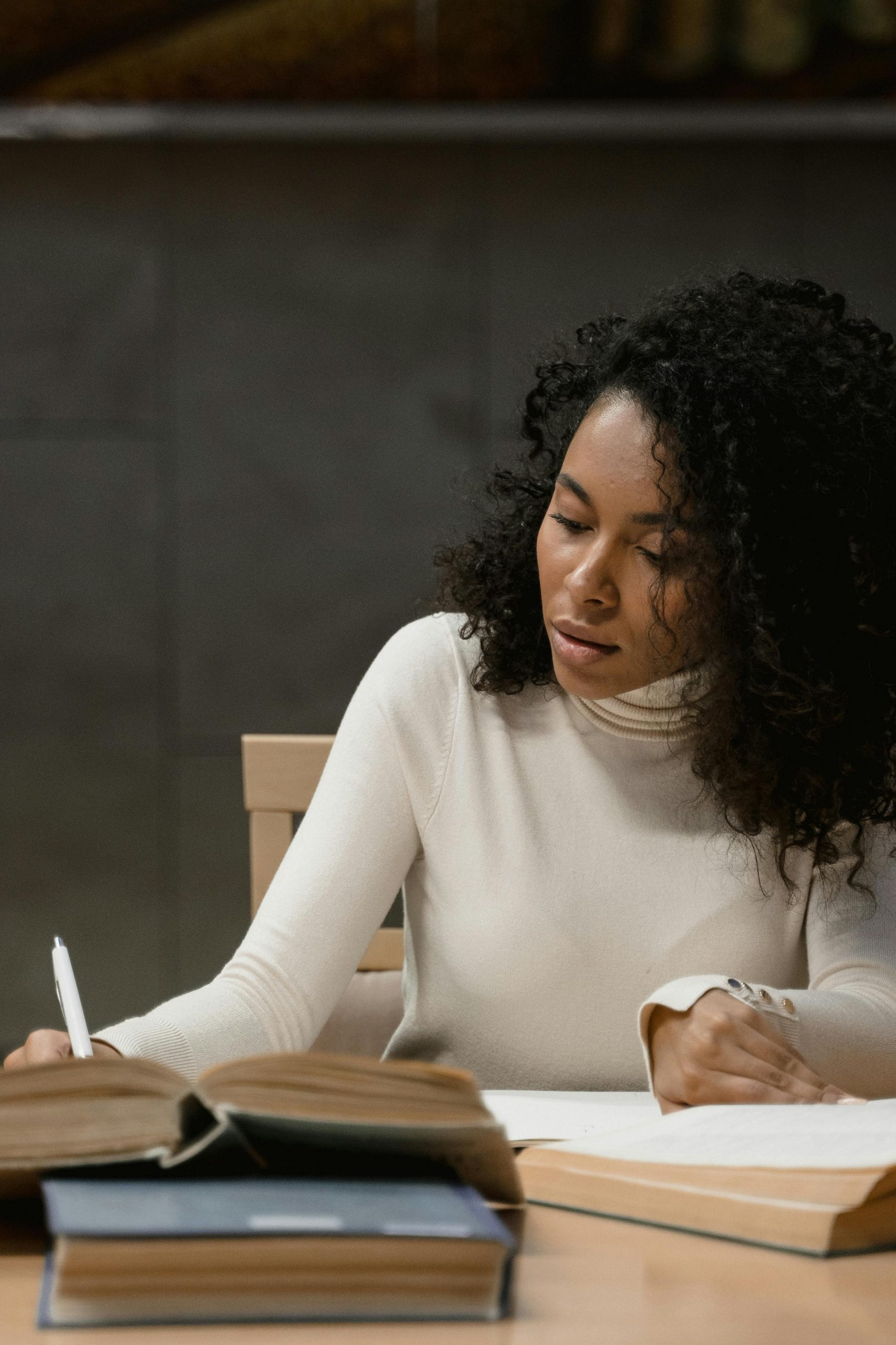 Woman Writing in Book 2