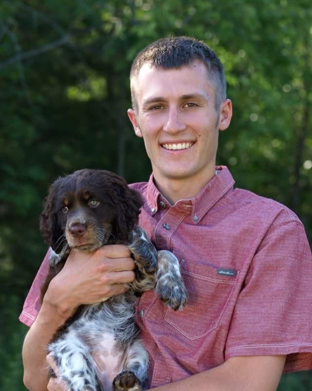 color photogrpahy of chapter 2 author. Colton J. Cnossen and his pupy River
