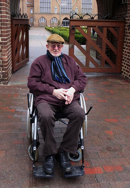 Elderly man sitting in a wheelchair