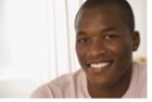 Male black student in light colored t-shirt