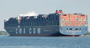 The container ship CMA CGM Christophe Colomb on the Elbe near Wedel