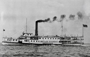 Photograph of the broadside view of the Myles Standish steamboat while underway (1883-1931).