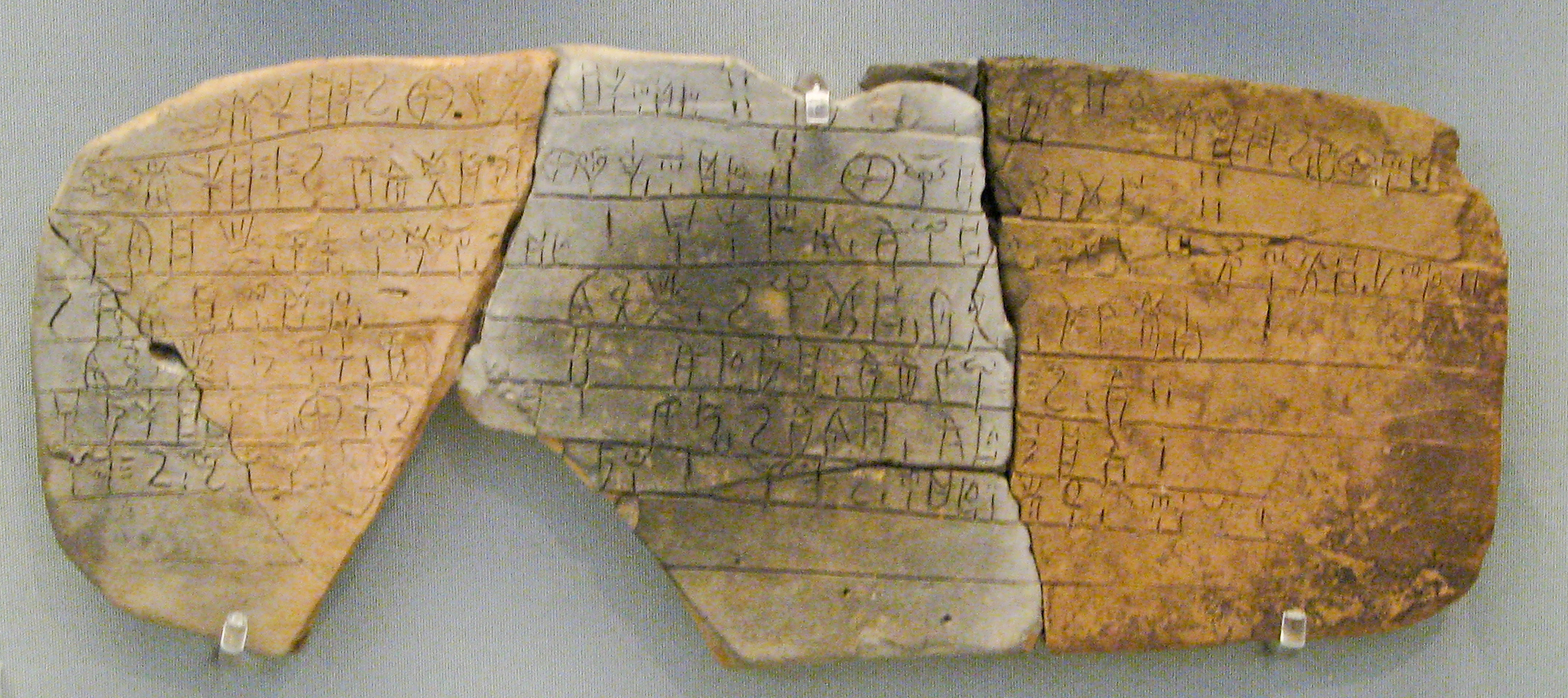 This ancient tablet is called Linear B and is broken into a few pieces.
