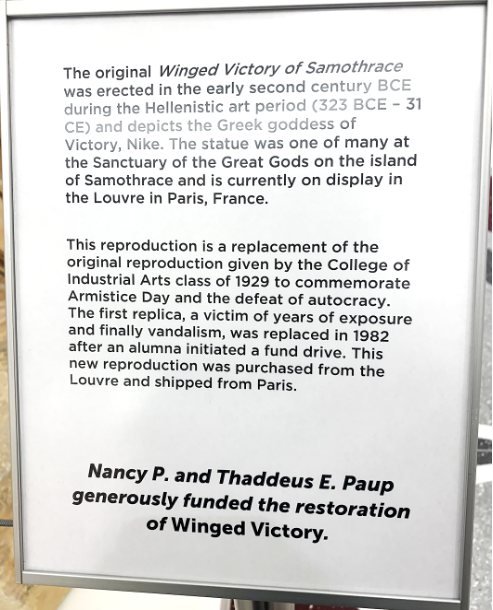 Image 2. Sign describing the History of the Winged Victory Statue at TWU
