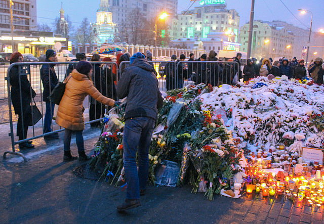Figure 4.1 People lay flowers outside the French embassy in Moscow in memory of the victims of the November 2015 Paris attacks. The Paris terrorist attack is an example of international terrorism.