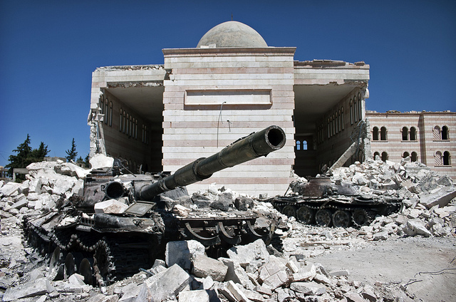 Figure 4.3 Two destroyed tanks in front of a mosque in Azaz, Syria. From March 6 to July 23, 2012, a battle between the Free Syrian Army (FSA) and the Syrian Arab Army (SAA) was fought for control over the city of Azaz, north of Aleppo, during the Syrian civil war