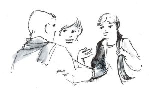 Standing in a circle, three people wearing scarves gesture in a way that indicates conversation.