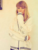 Taylor Swift posing for a camera shoot.