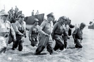 General Douglas MacArthur Wades Ashores during Initial Landings at Leyte, Philippine Islands.