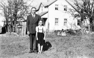 Julius Kirmse and Helen Kirmse in front of the Louis Kirmse home.