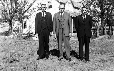Three Kirmse Brothers in front of the house they grew up in