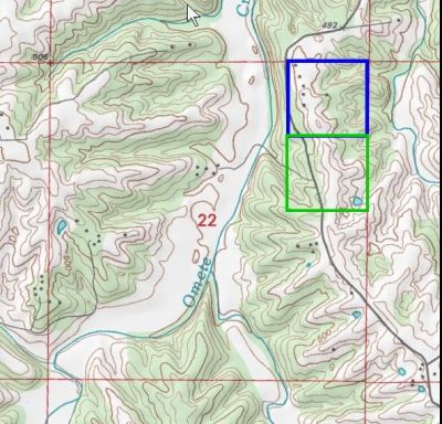 USGS Topographic map showing Section 22 with the original 40 acres outlined in blue and the adjoining 40 acres outlined in green
