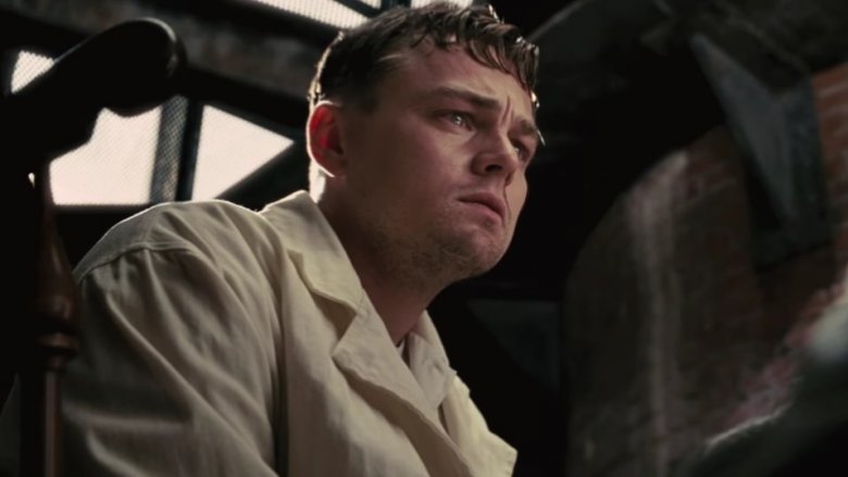 Picture of Leonardo DiCaprio in the movie "Shutter Island." He has a worried, intense stare.