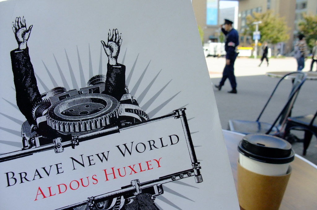 cover of the book Brave New World with cup of coffee in the background