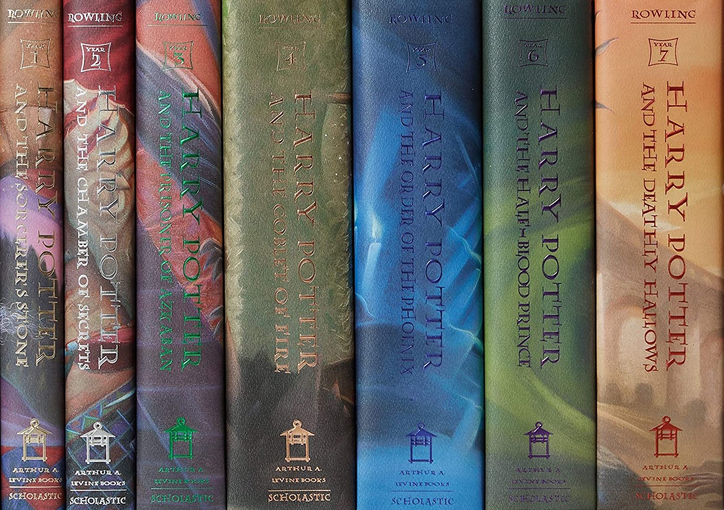 image of the spines of the seven books in the Harry Potter series