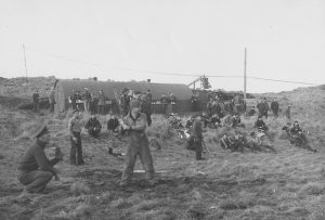 Men playing baseball during WWII