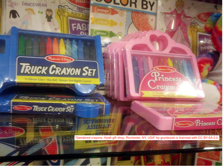 gendered crayons. blue truck shaped box for boys, pink crown with heart box for girls