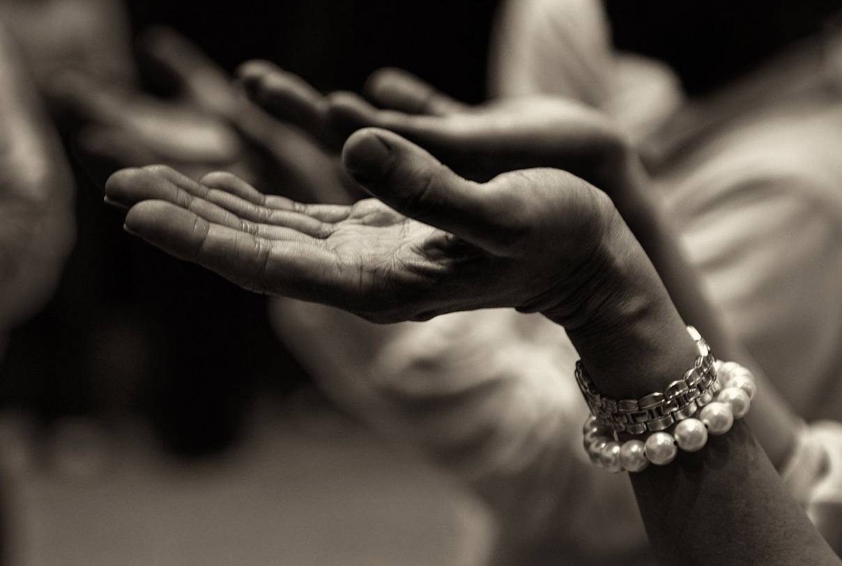 image of hands lifted in worship