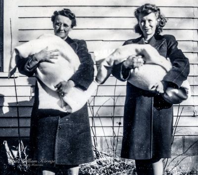 Hilda and Mildred holding Judy and Janice - c1945