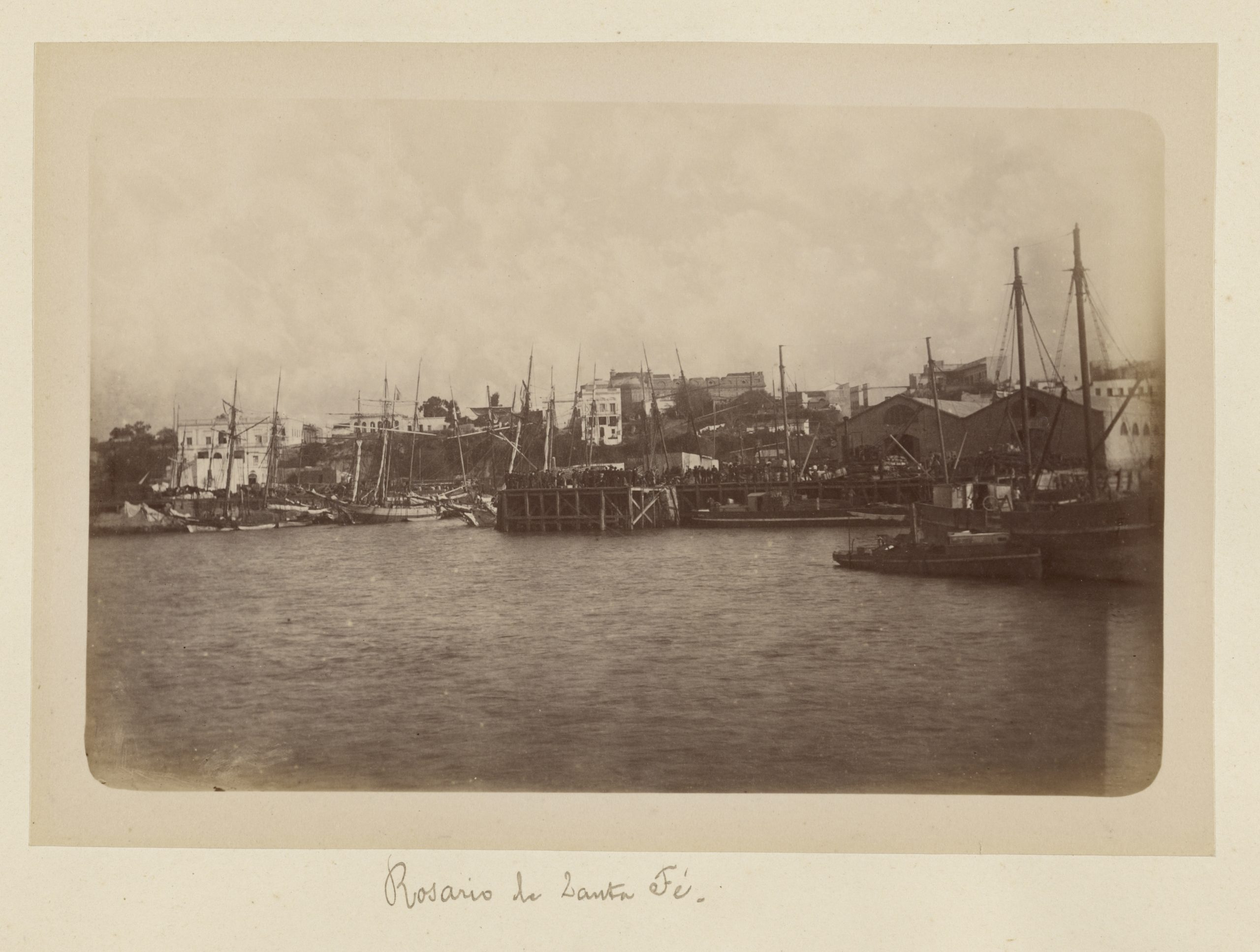 Albumen silver print of Rosario de Santa Fé in 1884 showing ships in the harbour.