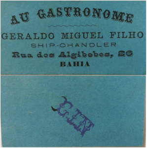 Front and back of a "cheque to bearer" used in the absence of a functioning currency during political upheaval in Brazil in 1893. This example shows the word "Gin" stamped on the reverse of a green card printed with the text "Au Gastronome, Geraldo Miguel Filho, ship-chanders, Rue des Aigibebes, Bahia.